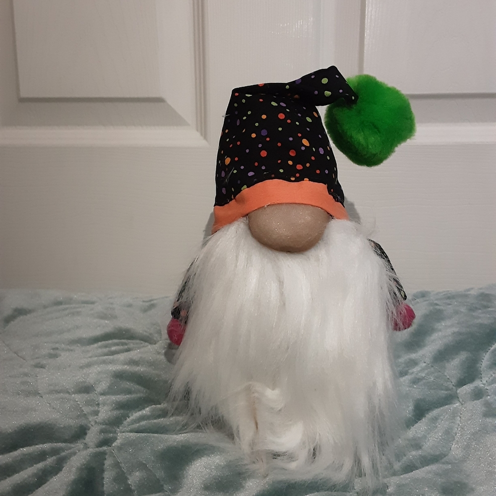 A handcrafted stuffed gnome
